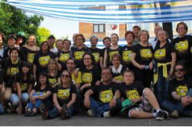 Pizarra con Manos Unidas