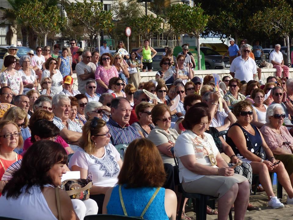 Rosario de la Aurora y misa celebrada en la playa el pasado 5 de julio