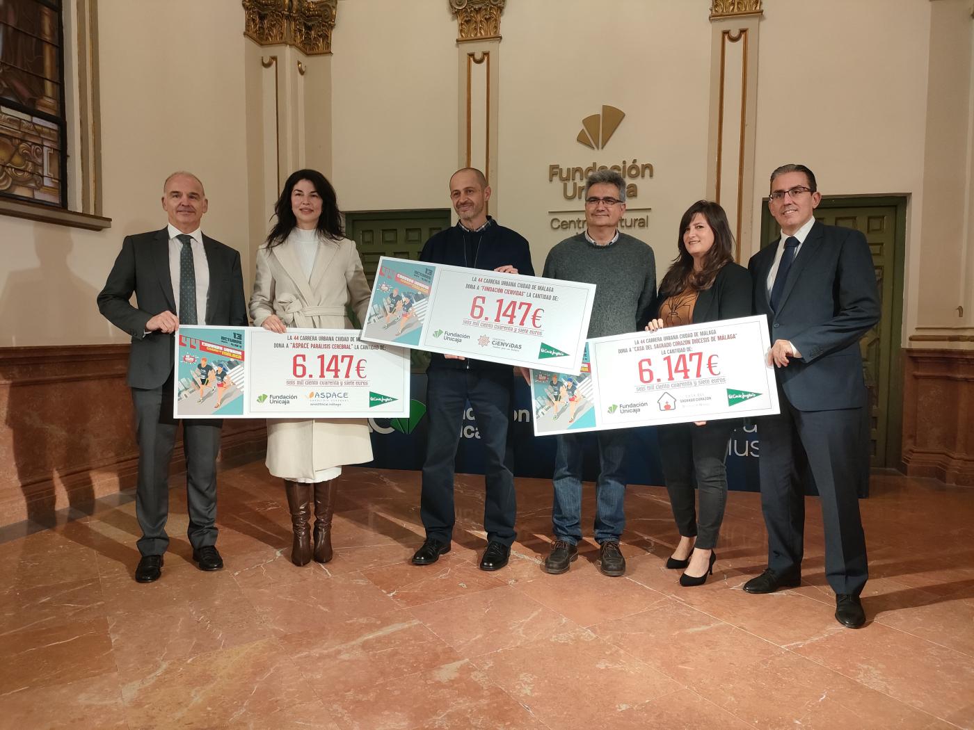Cotolengo recibe donación por la Carrera Urbana Ciudad de Málaga